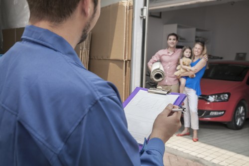 Packed boxes and furniture prepared for a Northharrow flat move