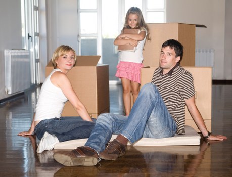 Packed boxes and furniture inside a Northharrow storage unit
